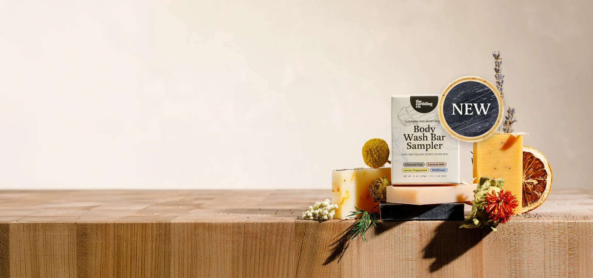 Body Wash Bar Sampler box on a butcher block with soap bars and dried flowers
